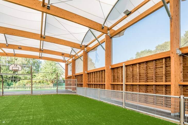 Charpente bois et membrane textile - préau sportif Versonnex (01)