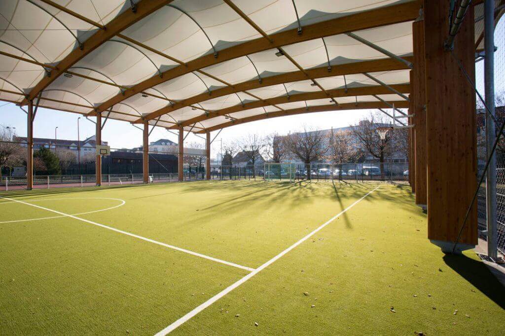 preau sportif avec charpente bois et toiture textile – poissy (78)