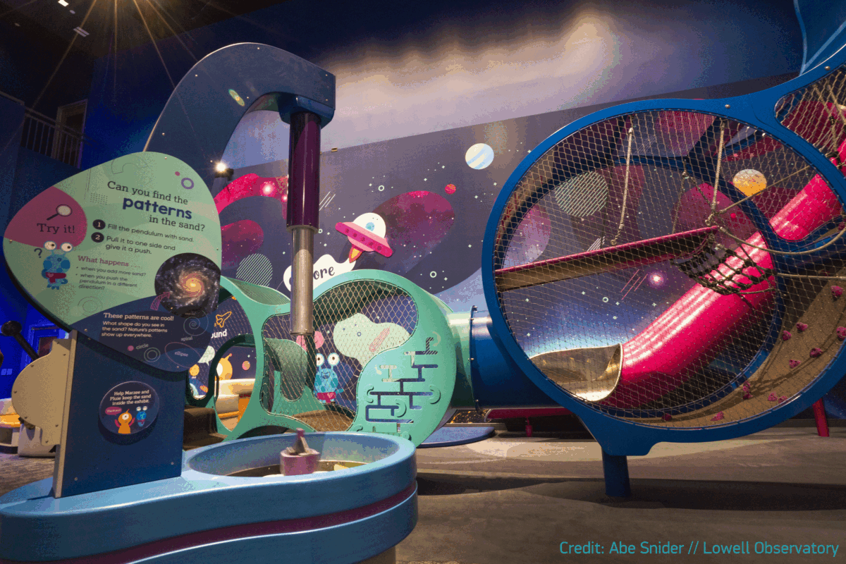 Construction of an indoor play area with 2 connected clouds and a slide in Flagstaff