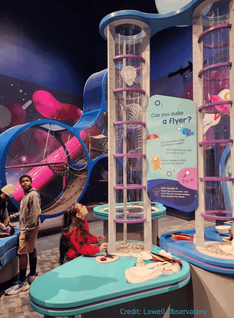 Construction of an indoor play area with 2 connected clouds and a slide in Flagstaff