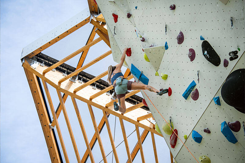 Construction of a climbing tower in Briançon, France, using timber framework and STFE roofing.