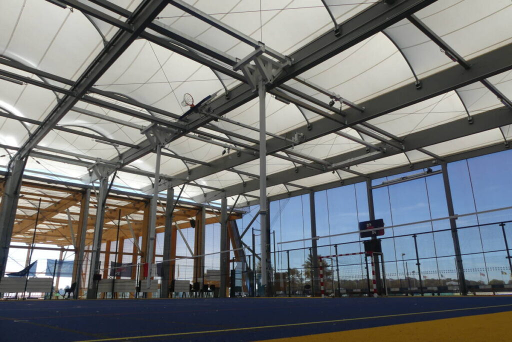 Construction of a new-generation sports complex with timber framework and textile membrane roofing by SMC2.