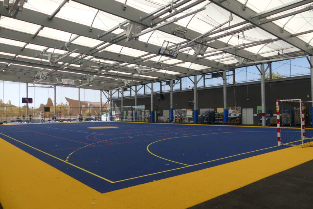 Construction of a new-generation sports complex with timber framework and textile membrane roofing by SMC2.