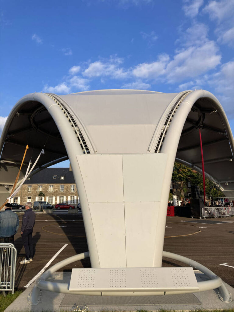 The VallyVellum in Guingamp: a monumental steel-and-fabric canopy spanning 13,940 sq ft, serving as an iconic centerpiece for Place du Vally.