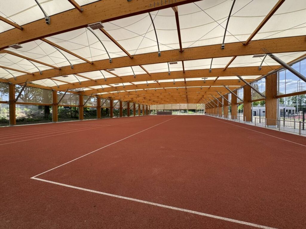 Mass timber and tensile roof sports canopy in Germany