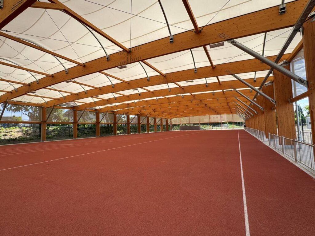 Mass timber and tensile roof sports canopy in Germany