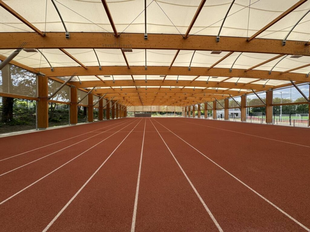 Mass timber and tensile roof sports canopy in Germany